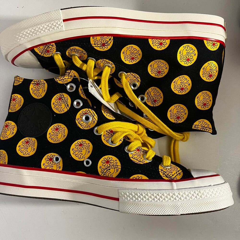 Converse x Keith Haring black sneakers with yellow circular Keith Haring figures